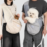 Breathable mesh pet sling carrier with cats/dogs inside; hands-free design, lightweight, airy for small pets.