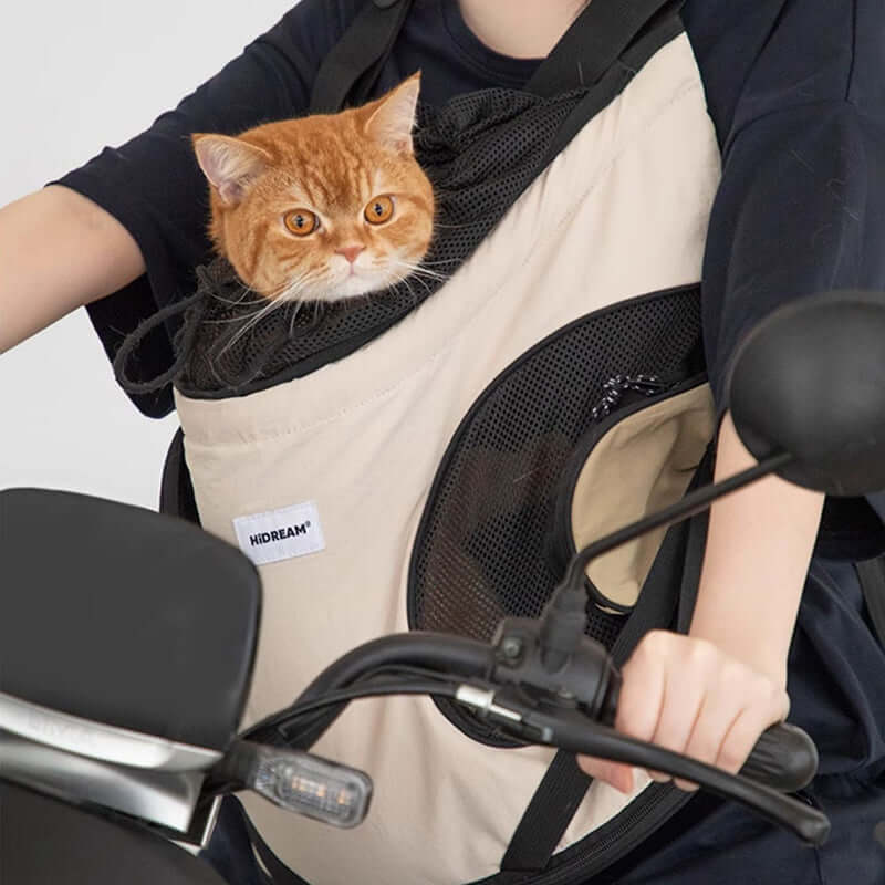 Front-facing cuddle pet carrier backpack with breathable mesh, secure opening, and ergonomic support for pets up to 13 lbs.